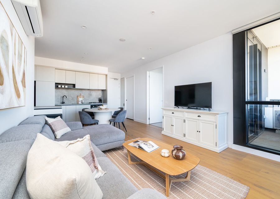 Spacious Living Area with Balcony Access
