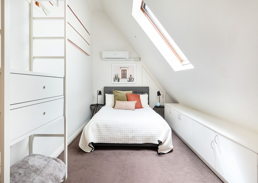 This bed is more than just a piece of furniture; it's a cocoon of comfort and tranquility.