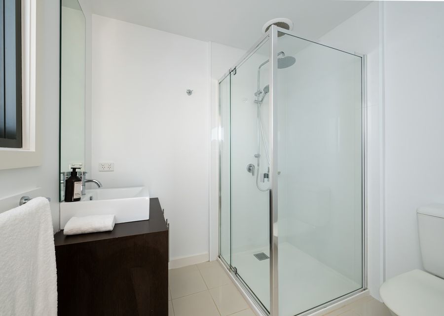 Ensuite bathroom with shower and toilet