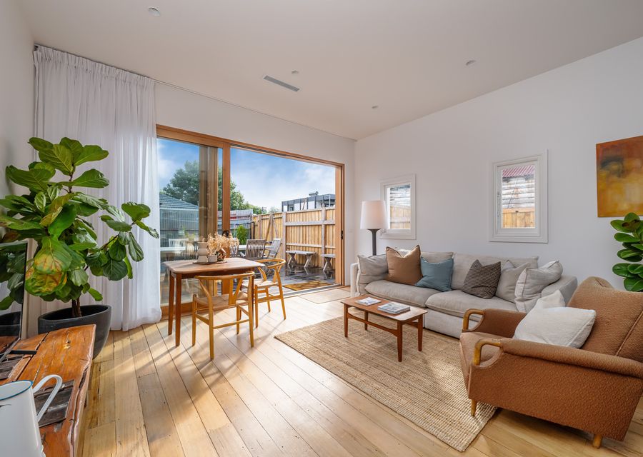Spacious living room with access to the backyard