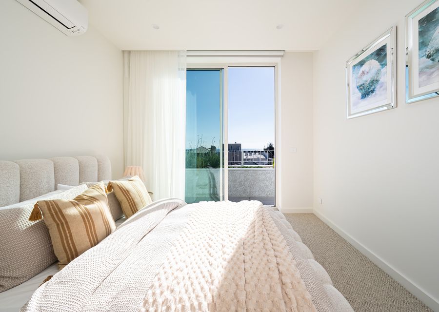 Master bedroom with queen bed