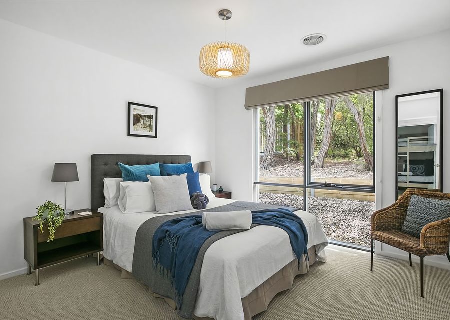Enjoy the elegant fixtures in this bedroom