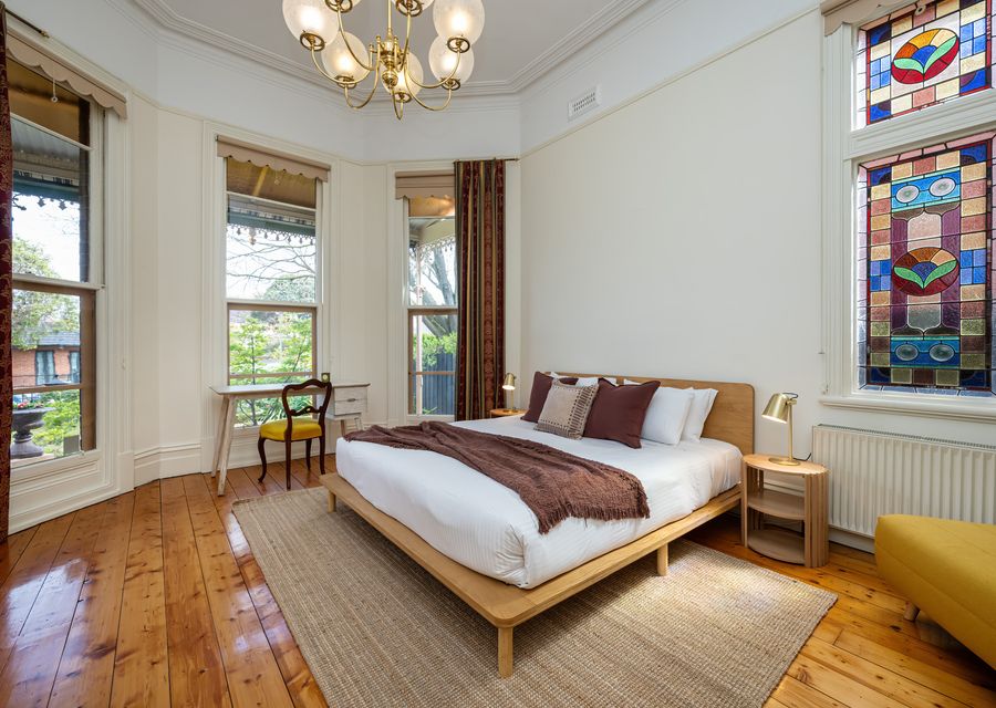 Bright bedroom with a comfortable bed