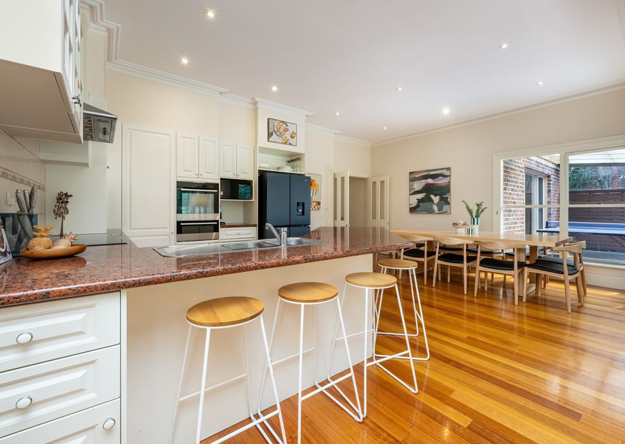 Bright kitchen with breakfast bar seating