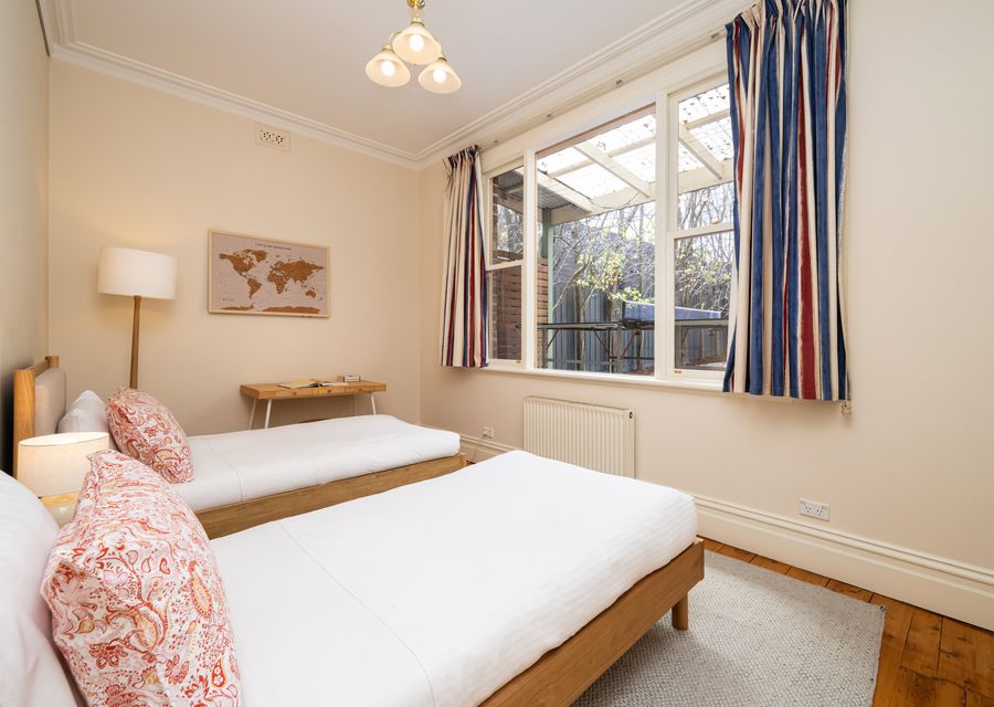 Bright twin bedroom with natural light