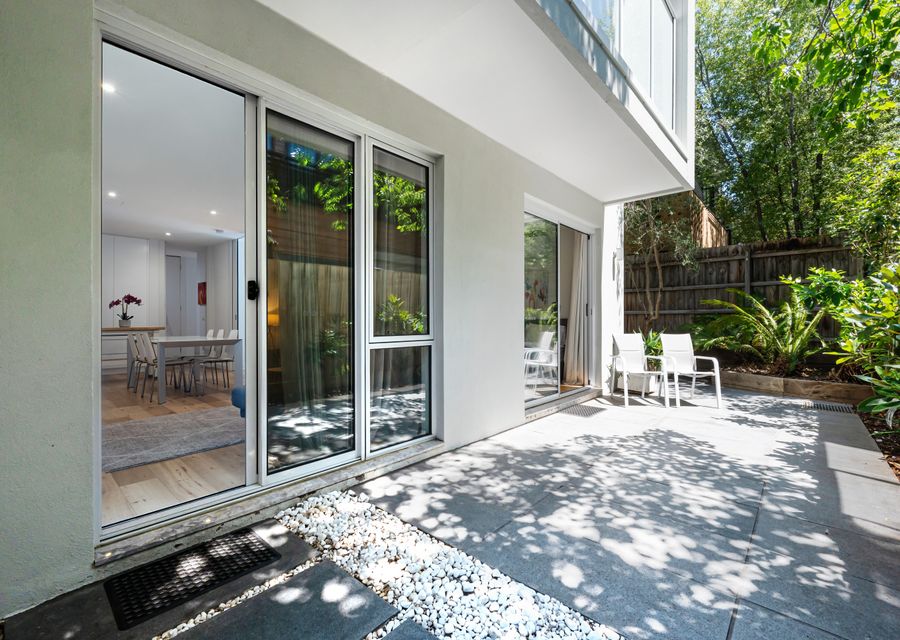 Sunny Courtyard with outdoor seating and BBQ