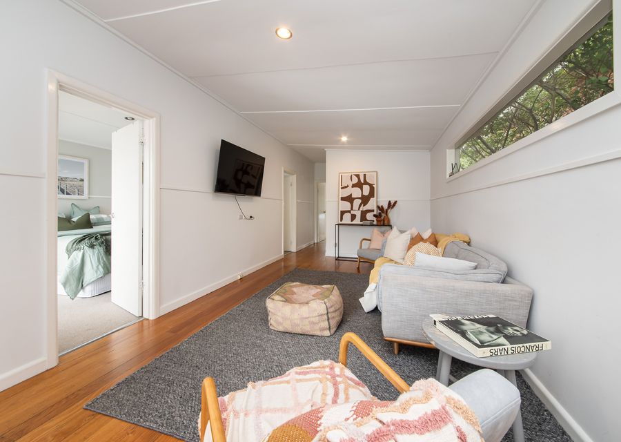 Living area with smart TV and split system