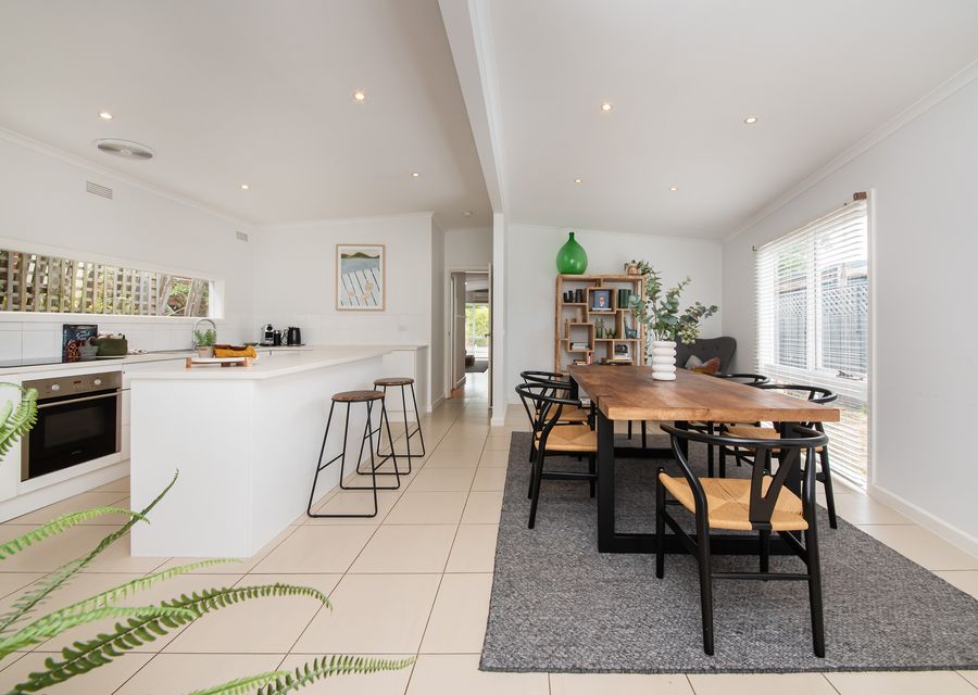 Welcome to our modern and well equipped kitchen, adjacent is our wooden and elegant dining table.