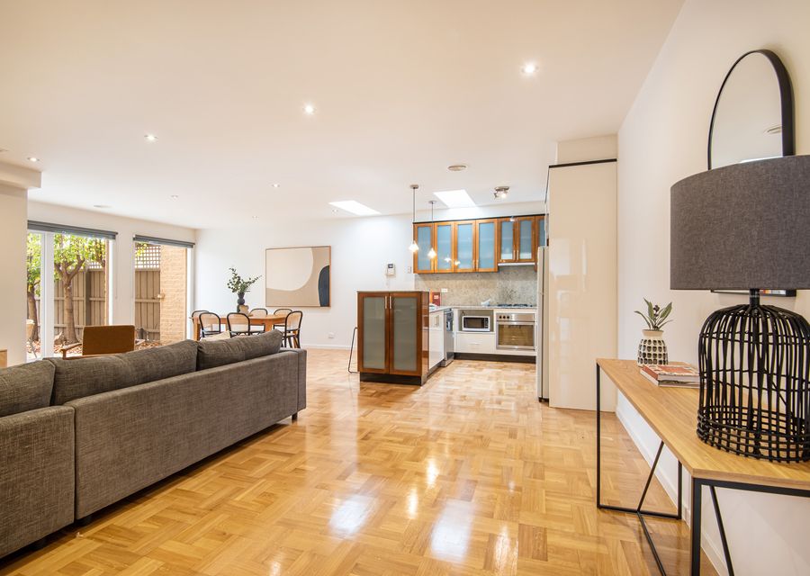 Open plan living, dining, kitchen leading out to north facing courtyard