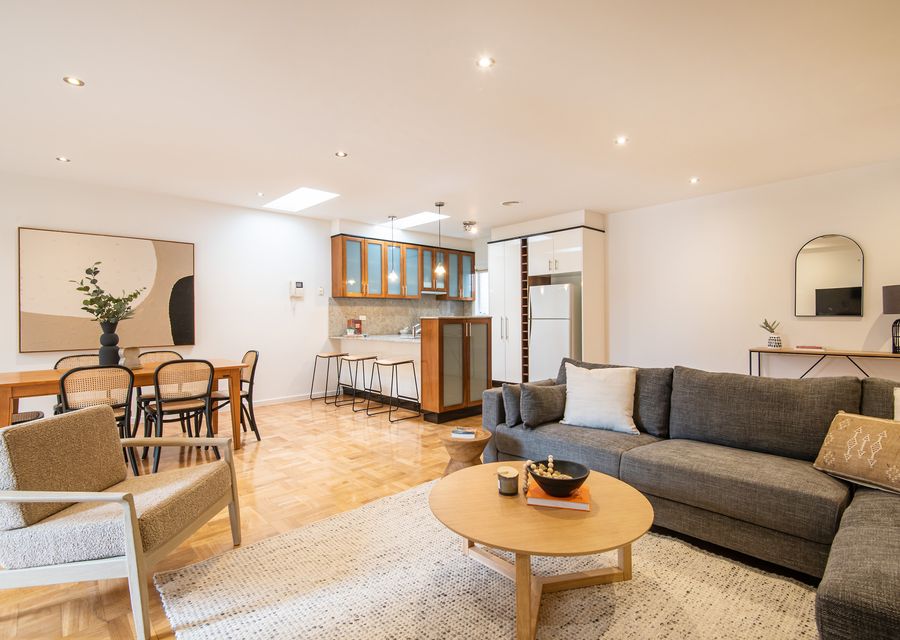 Open plan living, dining, kitchen leading out to north facing courtyard