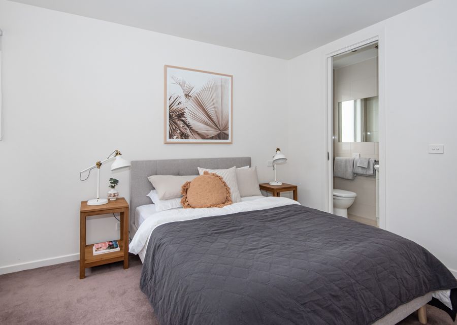 Master bedroom wit queen bed and en-suite