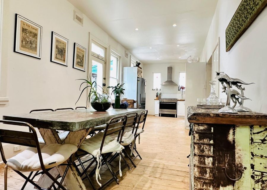 Spacious bright, airy kitchen with eating area and door leading onto the expansive garden