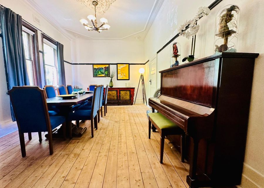 Dining area with seating up to 10 people and fully functional piano