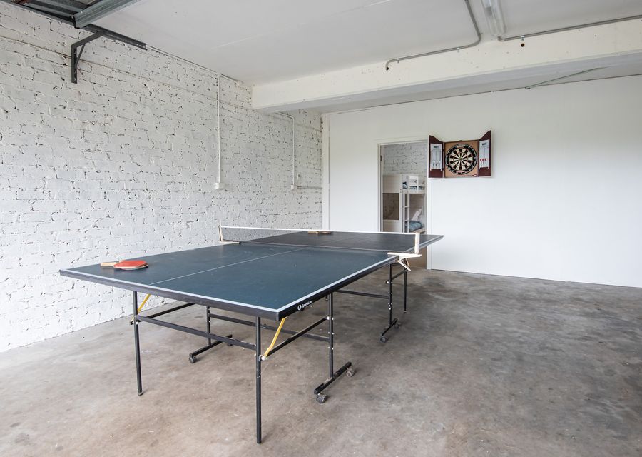 Games room with ping pong table 