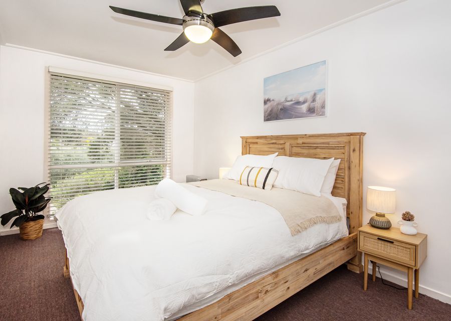 Bedroom one with queen bed 