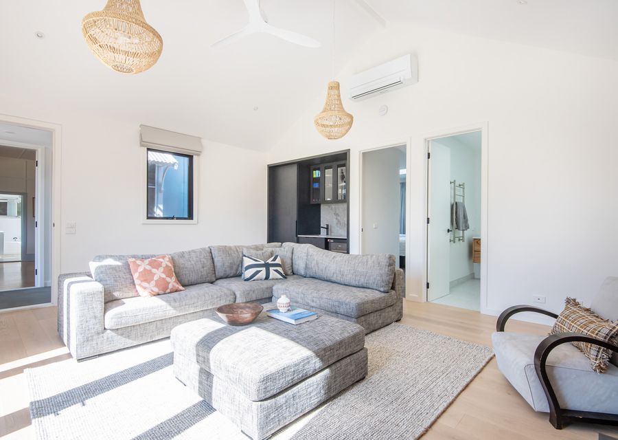 Light filled lounge with fireplace