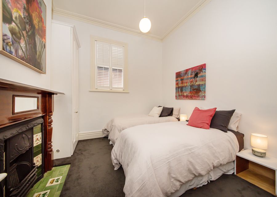 Bedroom 3 with 2 king single beds