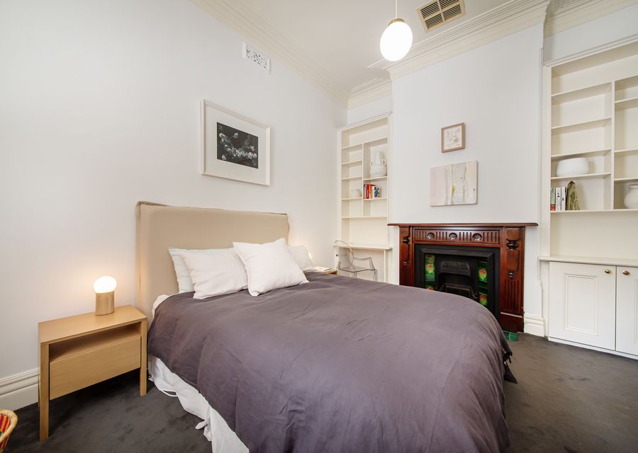 Bedroom 2 with Queen bed and ornamental fireplace