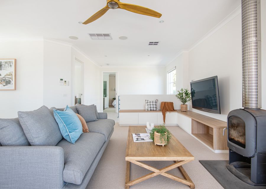 Upstairs living with smart TV and woodfire