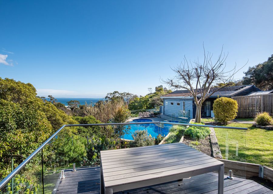 Enjoy the view of lush greenery and natural light from our outdoor dining space.