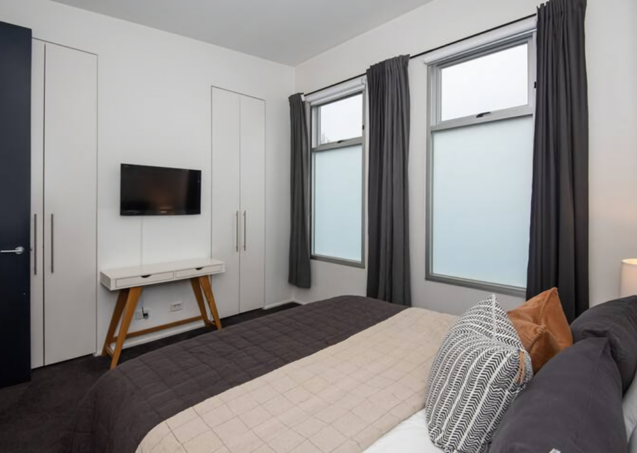 Master bedroom with TV