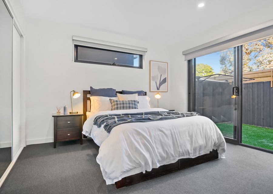 Downstairs queen bed bedroom with secure courtyard access