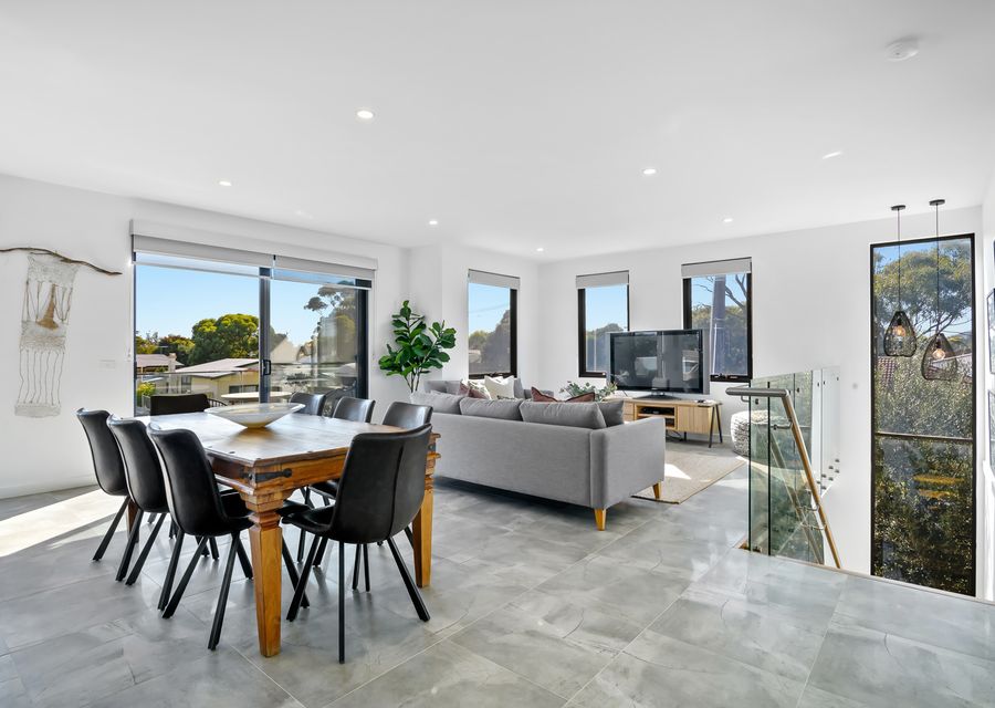Open plan, light, bright and luxe living and dining area.