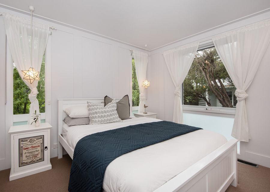 Bedroom three with queen bed