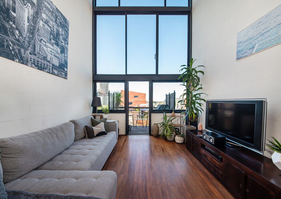 Spacious living room with so much natural light
