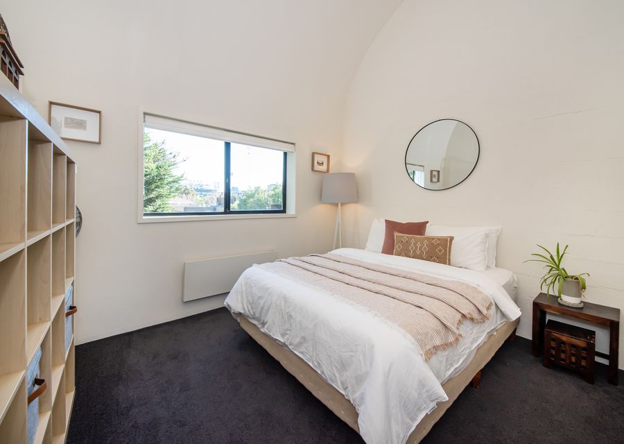 Bedroom 2 with queen bed on top floor