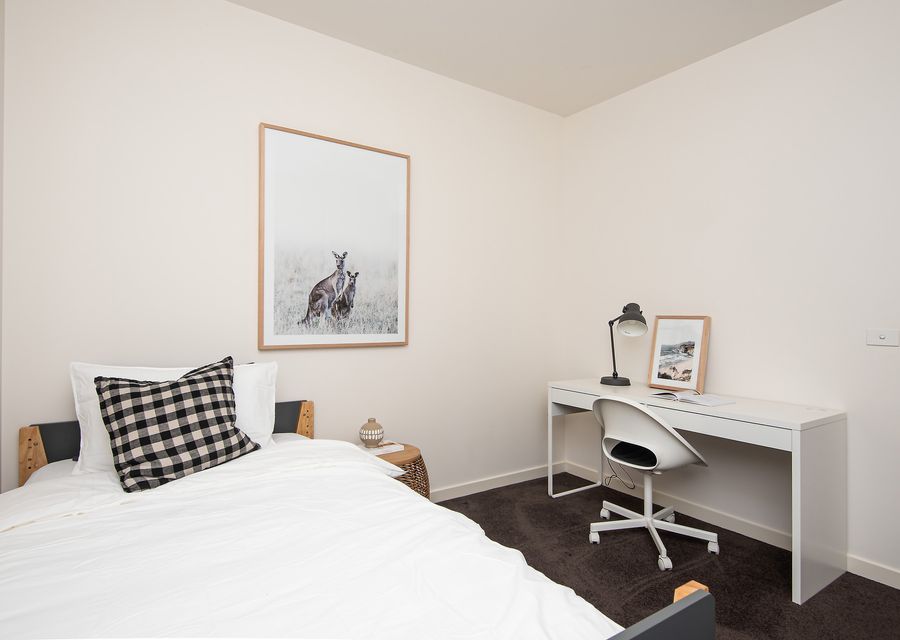 Bedroom 3 with king single bed and dedicated work space