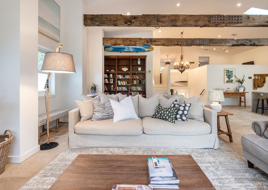 Step into our inviting living room, where warmth, comfort, and entertainment converge in perfect harmony.