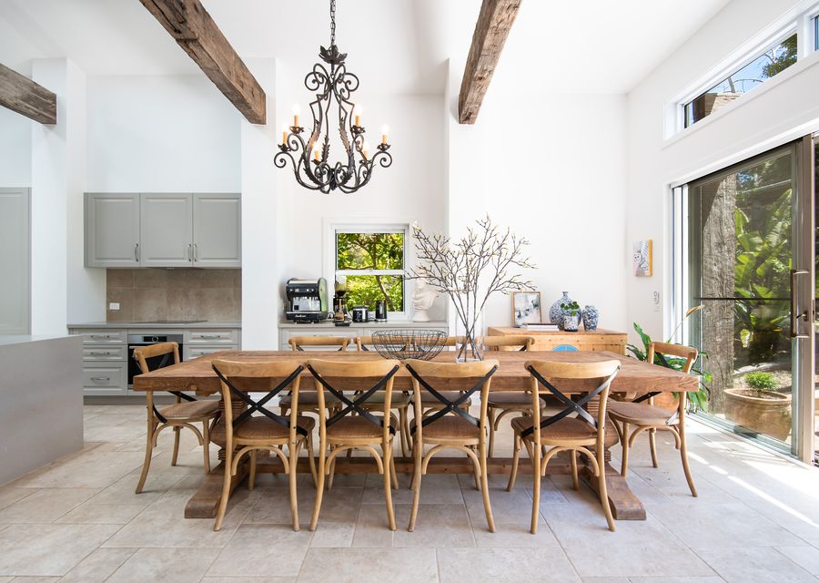 Crafted from rich, sturdy wood, this table is as beautiful as it is functional. Its generous size comfortably accommodates up to 10 guests.