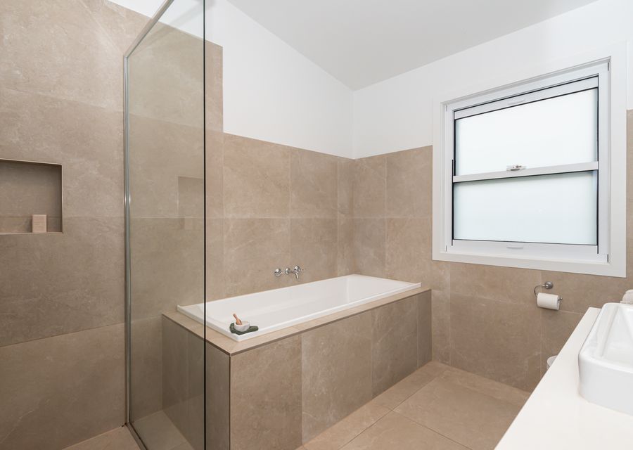 Main bathroom with bath and shower 