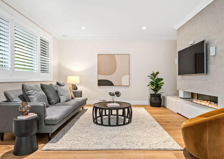 Main living with gas fireplace and smart tv 