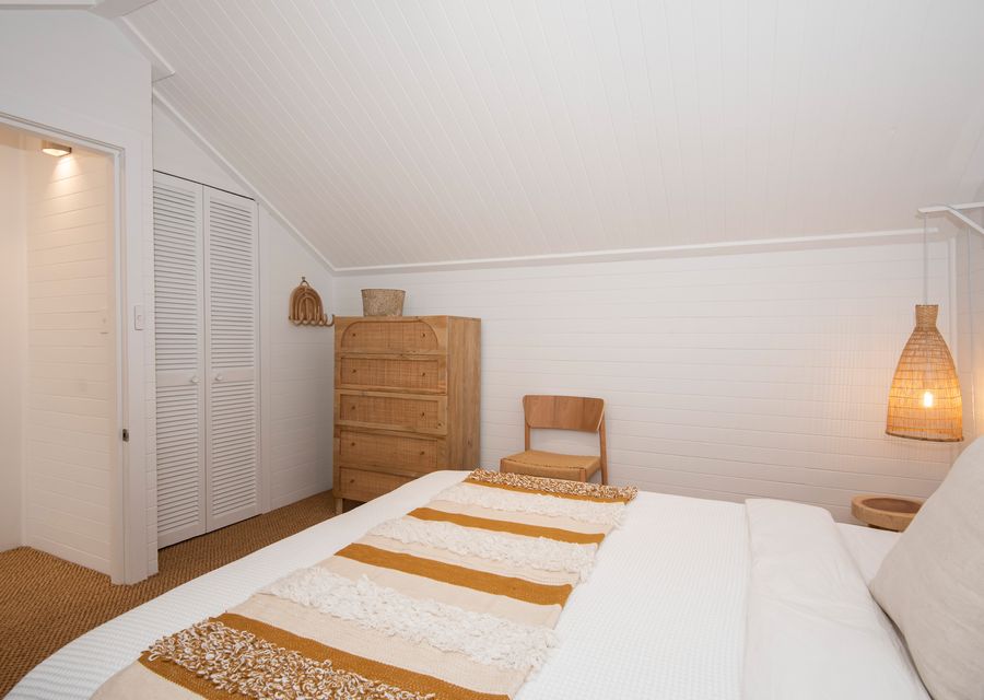 Cosy bedroom with drawers for organising clothes or other items 