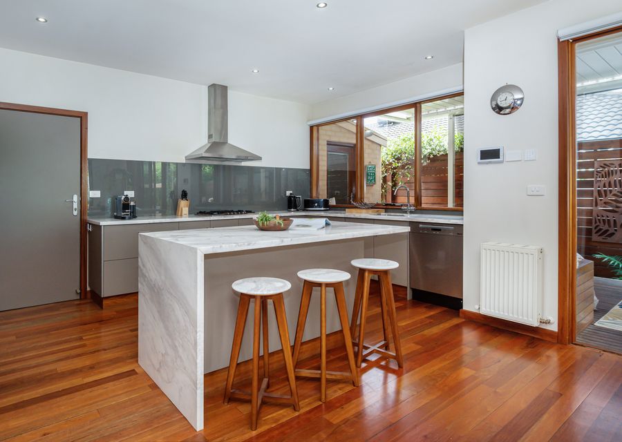 Kitchen with breakfast bar with seating for 4