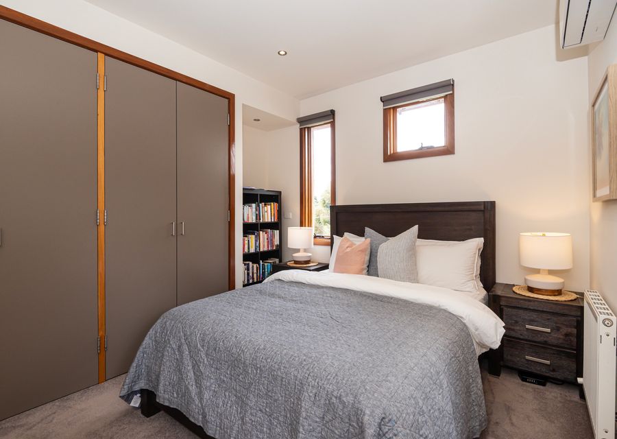 Bedroom 2 - Queen Bed with plenty of storage and styled comfort