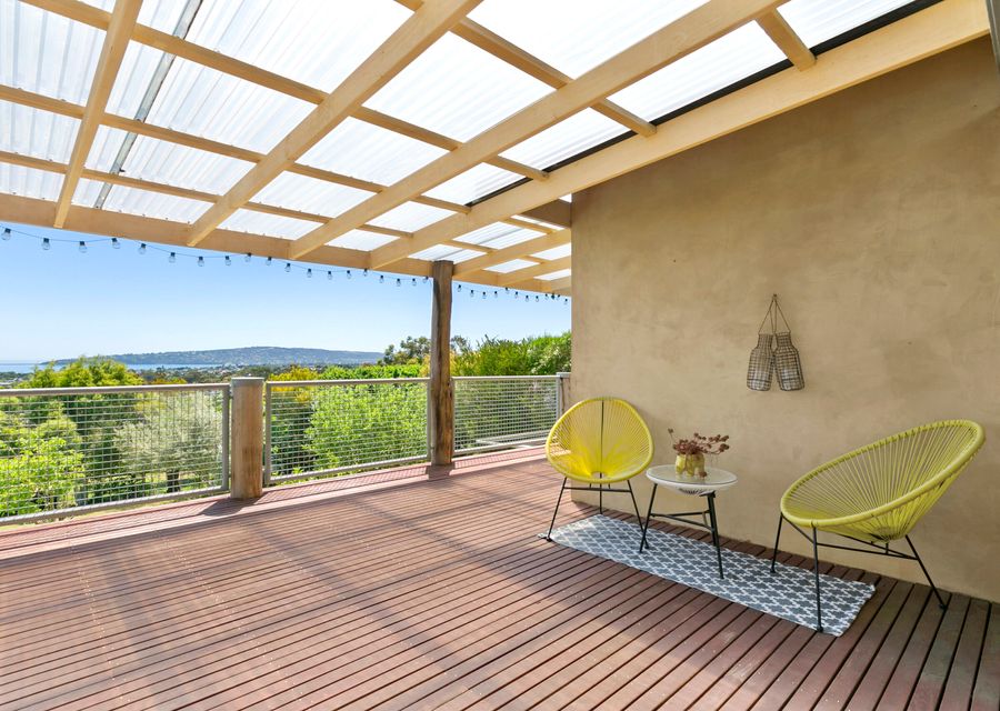 Large decking with outdoor dining and BBQ