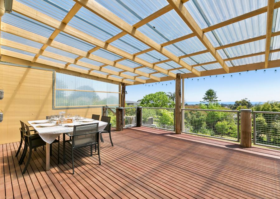 Large decking with outdoor dining and BBQ