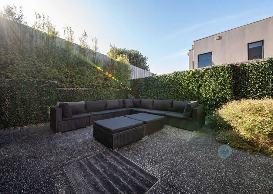Rear courtyard with ample seating