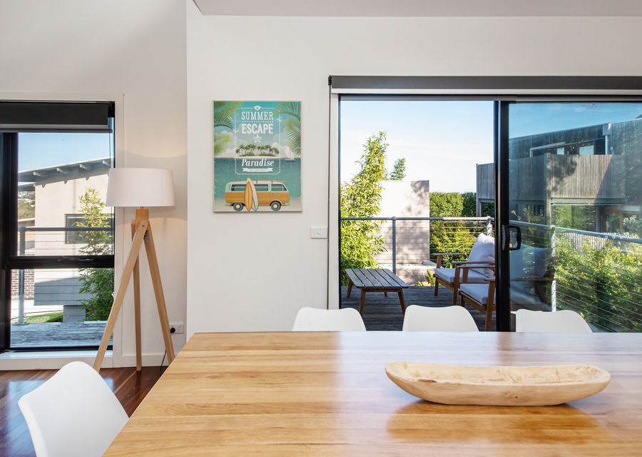 So much natural light filtering into the upstairs living, kitchen and dining area.