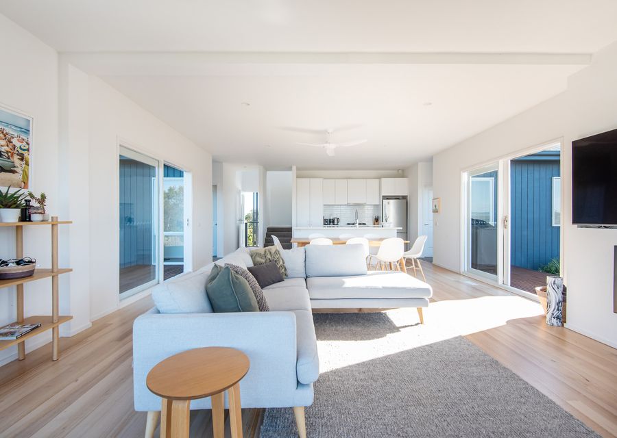 Main living, dining and kitchen and smart Tv and gas fireplace 