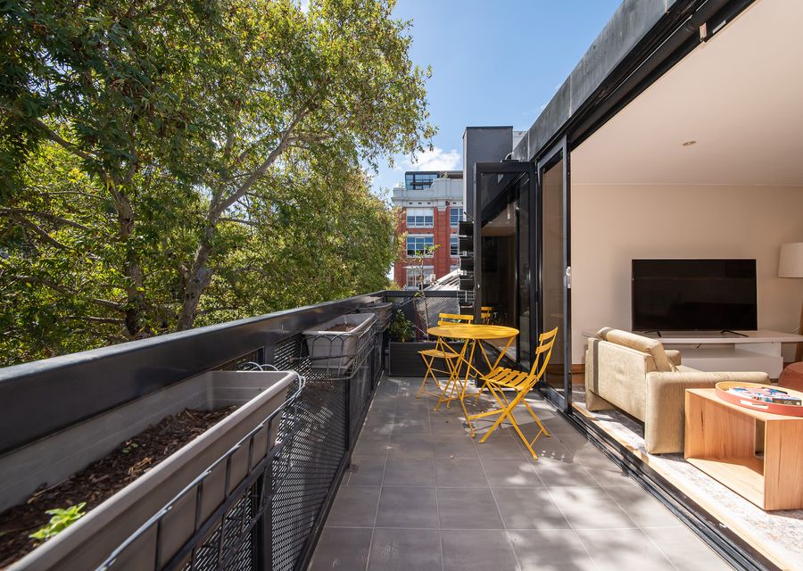 All the natural light from the north facing terrace streaming in to the living room