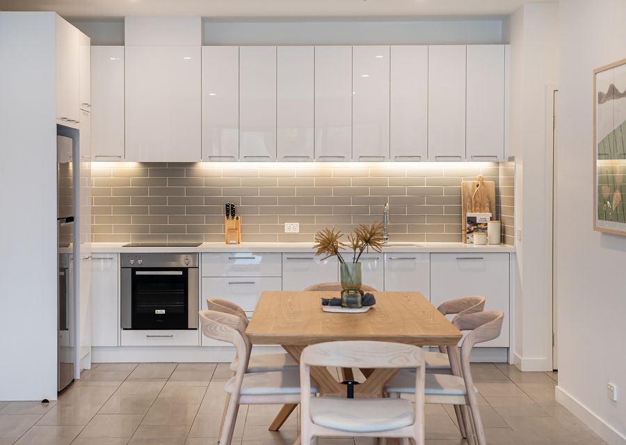 Two steps from the table to the kitchen. Can't get any easier. 