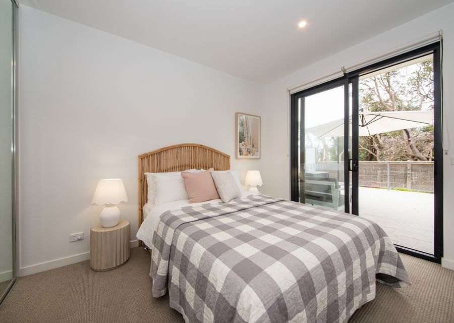 Master bedroom with access to the patio. 