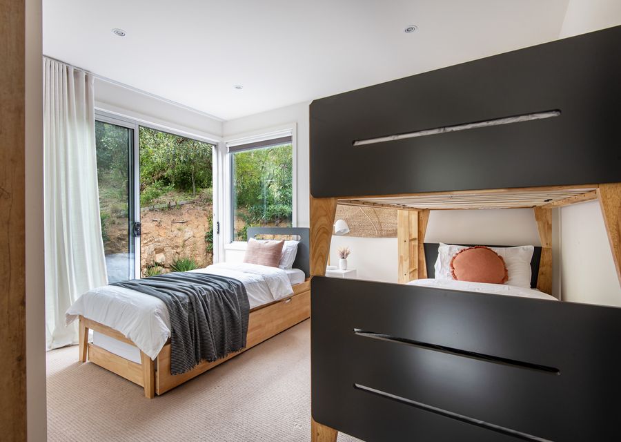 Sinlde bunk and single bed with a trundle 