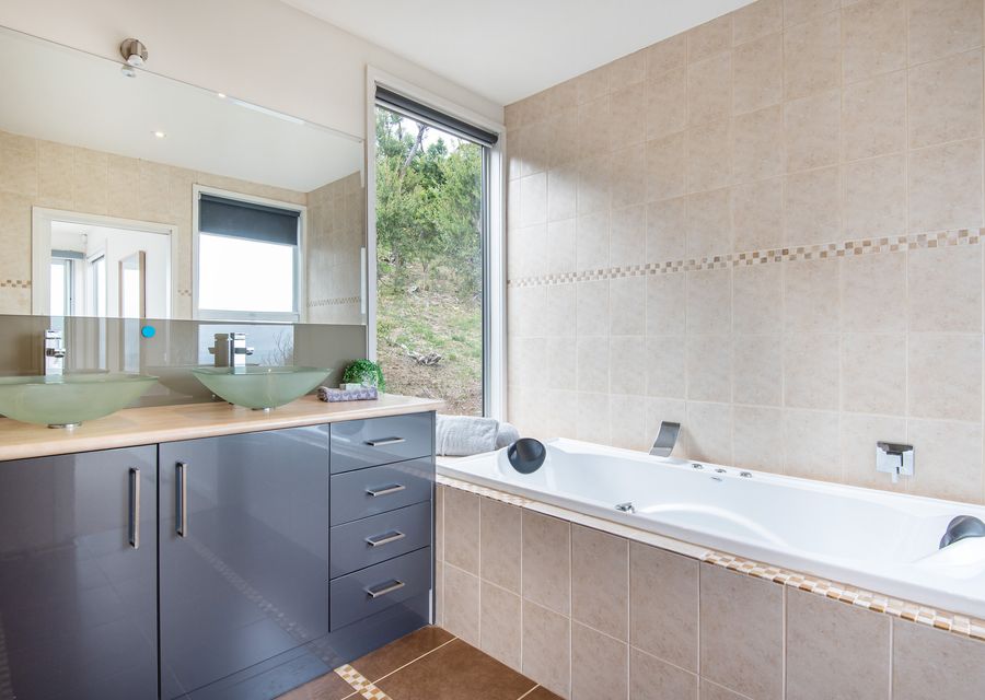 Main bathroom with bath and shower 