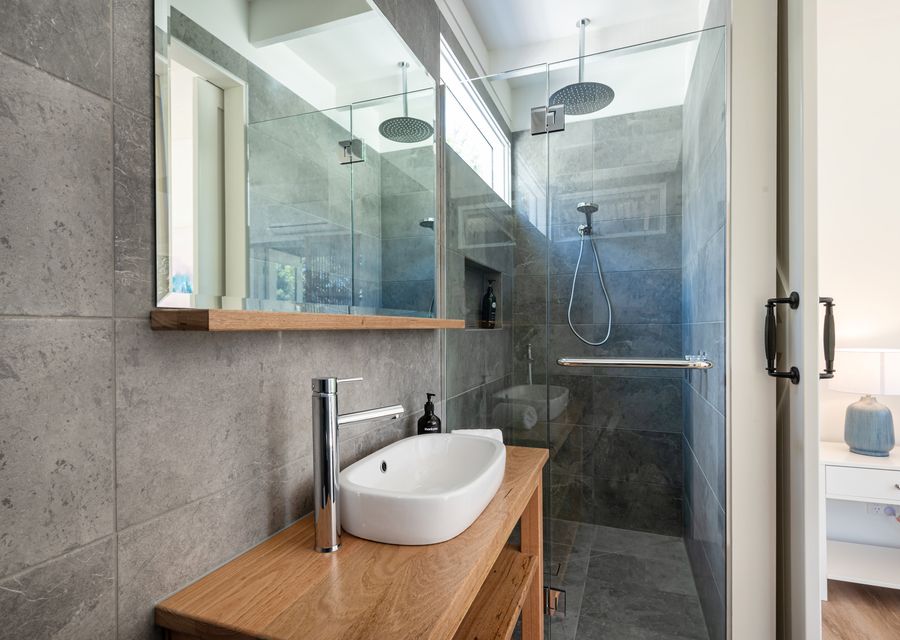 Ensuite bathroom with shower and toilet, attached to bedroom one