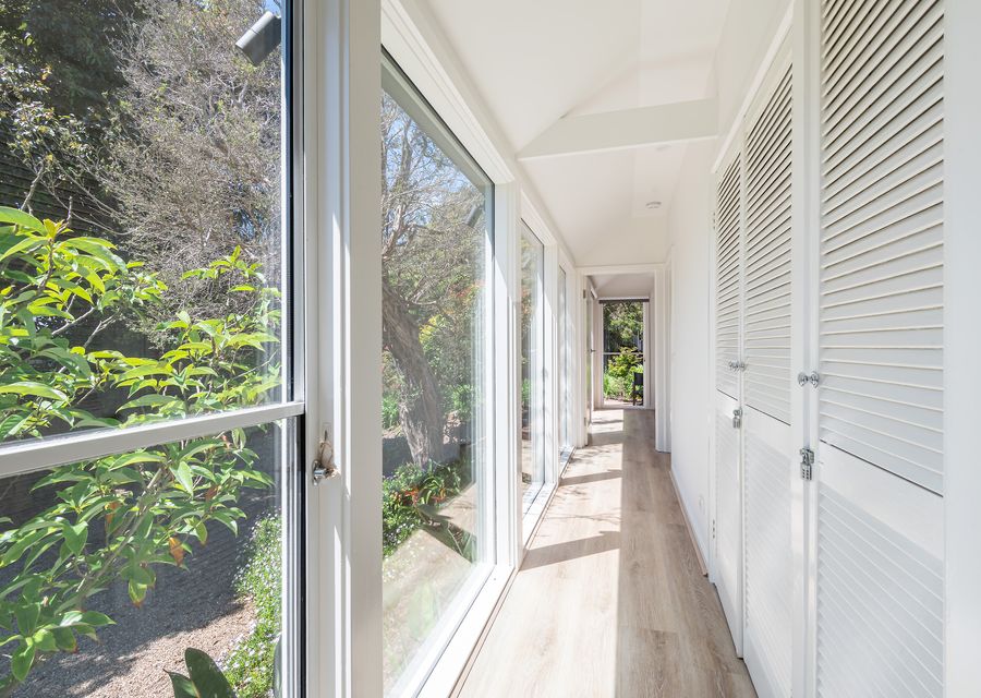 A hallway showing the outside garden
